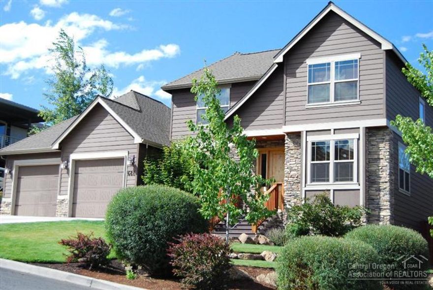 Get ready to fall in love with this home! Open great room w/huge vaults, rock surround gas fireplace, rich wood accents & hand troweled walls.Kitchen is complete w/alder cabinets, concrete counters, hardwood floors & stainless appliances. Master on the main & 3 oversized bedrooms upstairs. 4th bedroom could also be a bonus room. The .25 acre lot has a large backyard & deck w/ mature landscaping; perfect for summer BBQs & entertaining. The fabulous location is w/in walking distance to downtown & many trails!