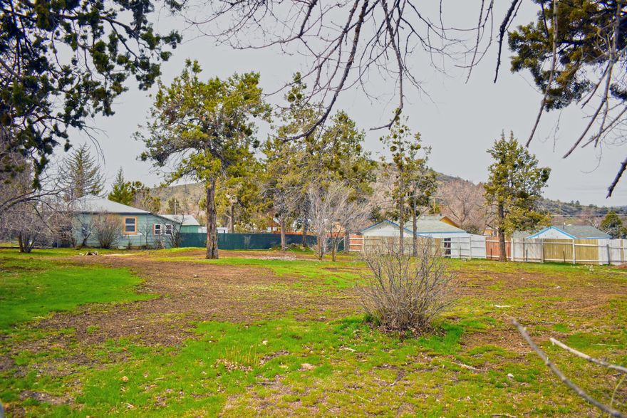 Wide & spacious, vacant, 0.3 acre residential lot is ready for your new home! Per City of Klamath lot is zoned Medium Density, utilities are available at the street and zoning allows for Single Family, Duplex/Triplex or Fourplex to be built. Lot is surrounded by existing homes on a quiet street near Dollar General and Keno Grill with easy access to Highways 97 & 140, as well as Kingsley Field and Walmart. Nice views, already fenced. Contact the City of Klamath for more information. Buyer to do own due diligence on all building permits/land uses with both the city and county.