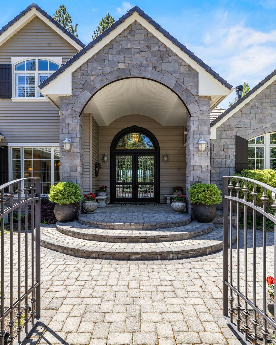 Discover enviable Cascade Mountain views from this exquisite Broken Top home on a generous .74-acre estate lot along the 6th fairway & green. Casual & formal living areas greet you under high ceilings & large windows overlooking the Cascade Mountain range beyond multiple terraces, lush lawn, & tranquil waterfalls. Fine architectural elements are crafted w/ easy living & entertaining in mind. Offering a grand living room displaying Cascade Mountain & Golf Course views, a bright & sunny chef's kitchen, wine room & breakfast nook w/cozy fireplace. Wake up to glorious Cascade Mountain & golf course views from main level primary suite. Main level also offers a handsome office, art & exercise studios. 2nd level loft/library leads to two luxurious guest suites. Enjoy year-round alfresco dining, & a breathtaking backyard w/ glistening mountain and emerald green golf course views. Masterfully crafted w/ an inviting French Country ambiance, this residence stands as the crown jewel of Broken Top