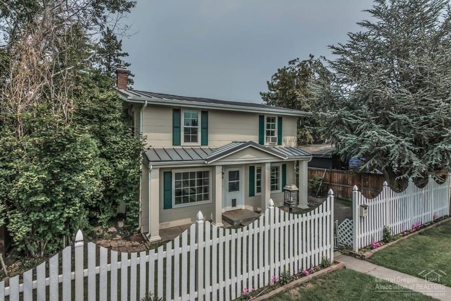 Downtown home with additional guest quarters near OSU Campus. Main home is 1792 SF, 3 bedrooms, 2 baths, office with built-ins, living room, gas pot belly stove, maple wood floors, vinyl windows, deck and more. Alley entrance garage has darling upstairs 812 SF guest quarters with 2 beds, 1 full bath, wet bar with dishwasher and refrigerator and balcony. Downstairs has 1 bay garage and an office with bathroom and a private paver patio! Onsite parking in back.