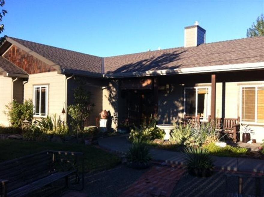 Beautiful tuscan style. Home on over .50 acre with irrigation rights. Built in 2003, 4 Bed/2 Bath, 1874 Sq.Ft. Many upgrades including newer carpet, tile and designer paint. The kitchen is galley style with beautiful granite counter tops arch ways and lovely gas fireplace in the great room. 2 car finished garage and large shed/shop in fenced back yard. Huge RV parking.