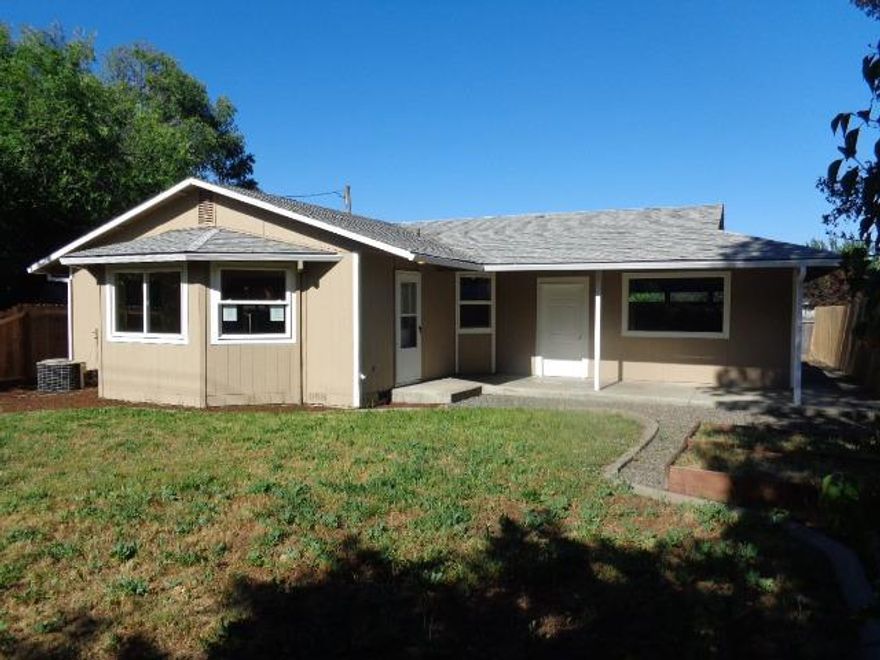 Incentives are now available on this property! Closing costs up to 3.5% closing cost assistance for eligible buyers. To Qualify buyers must reside in the home as their primary residence. This is a Fannie Mae HomePath property. New paint inside & out. New kitchen stainless steel appliances . New carpet and flooring. Also, new fencing on sides of lot. This property is located centrally to schools, shopping, medical & various outdoor activities around the Rogue Valley. Located On a flag lot. Front door is located around the left side of garage toward back of house facing Crater Lake Ave. Adds to the privacy factor. Nice area of homes. E-Z to show.