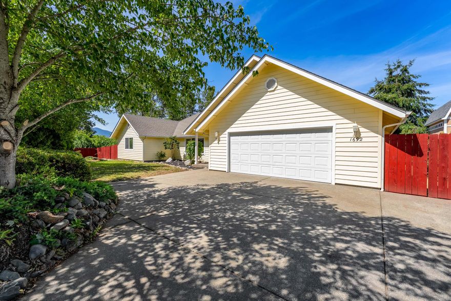 New on the Market! Just finished a complete remodel from the studs up, this 2,287 sq ft residence seamlessly blends modern design with rural charm. Featuring 3 bedrooms and 2 bathrooms, the home boasts an open-concept living area and a spacious kitchenâ€''perfect for entertaining. The primary bedroom includes direct access to the back patio, offering a private retreat. A dedicated laundry room with a sink adds functionality, while two additional bedrooms provide comfortable space for family or guests. Situated on a large, private corner lot, the expansive backyard offers plenty of room to create your own oasis for outdoor living, play, or gardening.