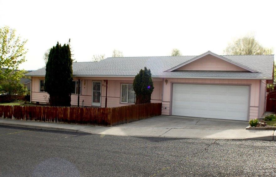 Been searching for a family home? Charming 3 bed, 2 bath, 1584 square foot home in Prineville. Unique vaulted ceiling in living room with exposed beams. Extra large utility room off kitchen could be a hobby area, provide extra storage or pantry space. In-ground sprinkler system in front yard. Great location, close to schools and shopping. Cute, clean and move in ready. Ready for your personal touch. A must see!