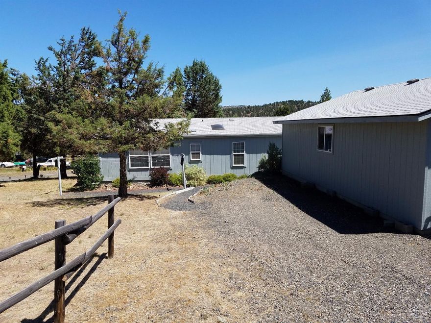 Very well maintained home close to Prineville Reservoir. Great views off the deck of this 3 bed, 2 bath home south of Prineville. Spacious, open floor plan, large kitchen area with island sitting area. Newer deep double car garage and 2 separate outbuildings, one with a concrete floor. Master bath has a jetted garden tub. All windows and doors have been updated to energy efficient windows and doors. Call for additional information.