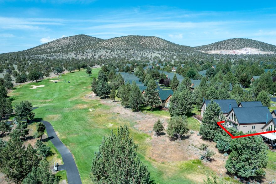 Live where you play! Charming chalet on the 14th fairway in Eagle Crest Resort—Central Oregon's playground for sports and nature lovers. Seller is offering a credit towards 3 months HOA dues! This turn-key escape features vaulted ceilings, new flooring, a cozy wood-burning fireplace, a spacious deck overlooking serene golf course views—ideal for entertaining or relaxing after a day of adventure. The two-car garage offers extra storage w/a drop-down ladder for all your gear. Steps from miles of BLM trails, pools, tennis, & a full-service rec center w/3 fitness facilities & hot tubs. Whether you're into golf, skiing at Mt. Bachelor, biking, walking your pup, or playing pickleball, this is your perfect basecamp. Low-maintenance living w/HOA covering paint, roof, landscaping, & snow removal. Ideal as a vacation home, rental, or full-time residence. Just minutes to Bend, the Cascade Lakes, & unlimited outdoor fun. This is your year-round escape in the heart of Central Oregon.