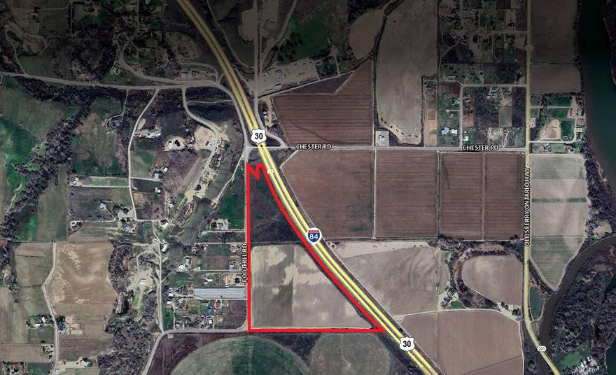 Located just five minutes from the heart of Ontario, Oregon, this 50.55-acre land on Foothill Drive presents a prime opportunity for agricultural or rural residential use. Priced at $495,000, the property is divided between two tax lots—1.69 acres zoned for Rural Residential (C-RR) and 48.86 acres zoned for Exclusive Farm Use (C-A1). With 32 acres of surface water rights and gravity irrigation, the land is well-suited for farming, while the remaining acreage offers dry grazing potential. A current farm lease is in place through 2025, providing immediate income. The property also boasts excellent access and visibility with prominent frontage on Highway 30/I-84. A portion lies within a floodplain, and there is potential for a building permit with conditional use approval by the county. Whether for farming, investment, or future development, this versatile parcel offers a rare blend of location, utility, and potential.