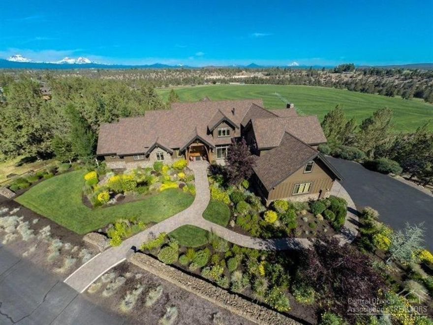 One of a kind estate in Deschutes River Ranch w/hiking, horse trails & river access. Exquisite quality & details throughout this tasteful home. Features 2 great rooms, office, fitness room, theater & 7 FPs. Gourmet kitchen leads to serene morning room w/views of pastures & Cascade Mtns. Private guest qrtrs. w/full kitchen, dining area, FP, bathroom & 2 bedrooms. Expansive barn/RV storage building adjoins large, private park-like area w/pond & covered outdoor kitchen for entertaining. www.20290rockcanyon.com