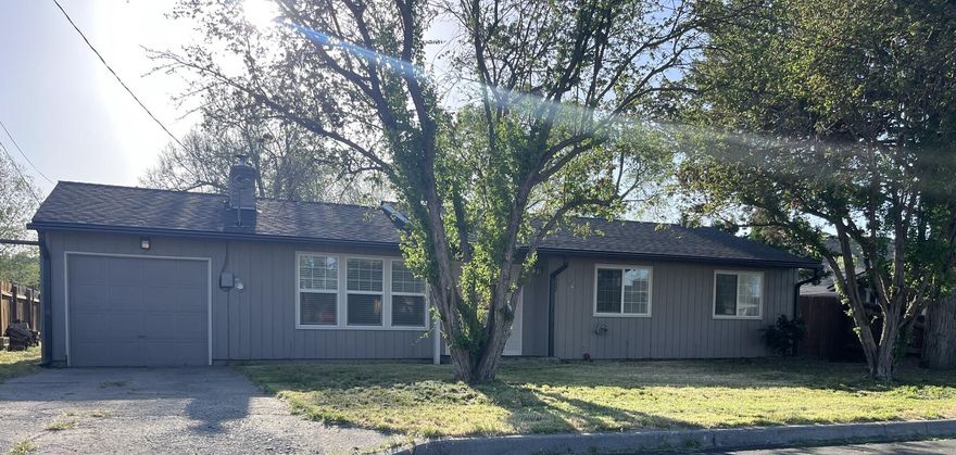 Are you looking for an AFFORDABLE home? This is a three bedroom two bath in an established neighborhood with space for a large yard or even a garden. It might be perfect for you! Recently sanded hardwood floors. Large closet in Primary Bedroom. Newer stainless steel kitchen appliances included. Electrical panel and in house lighting have been updated. New gutters installed in 2023. Wood Fireplace insert in living room. With many upgrades already done this home is move in ready. Call or text to schedule your showing,