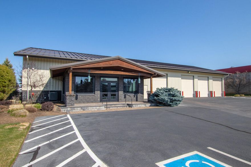 Owner user or investor industrial building opportunity.  Building can be delivered vacant for owner user or current tenant will stay for an investor or partial owner user.  Call for details.
Built in 2006, the building is upscale, clean, and great condition.  Beautifully appointed, and fully climate controlled office, masonry exterior wainscoating, polished and stained floors, two upscale kitchen areas, ample parking and great access.  Warehouses are fully sprinklered and heated.  Two bathrooms.  442 sf mezzanine.  Beautifully landscaped.