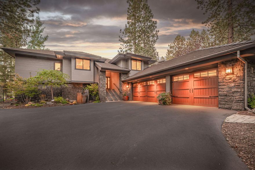 Nestled on the 1st hole with serene views of perfectly manicured greens, this exquisitely updated home effortlessly blends modern comfort with refined style. Light-filled rooms frame sweeping vistas from nearly every window. The kitchen is appointed with Thermador built-in appliances, a breakfast bar, and an inviting dining area perfect for everyday meals or entertaining. The home boasts all-new major systems, new windows, and a freshly painted exterior, creating the perfect setting for elevated living. Main level features a luxurious primary suite with fireplace, guest suite, and a versatile 5th bedroom/den/office. Relax on the expansive deck, complete with an oversized hot tub and gas fire pit, all with fairway views. Downstairs, discover two bedrooms, an updated bath, wine cellar, and abundant storage. A rare opportunity to experience refined luxury in one of Bend's most coveted gated communities. Golf course, pickleball, bocce ball courts, swimming pool, fitness, fine dining.