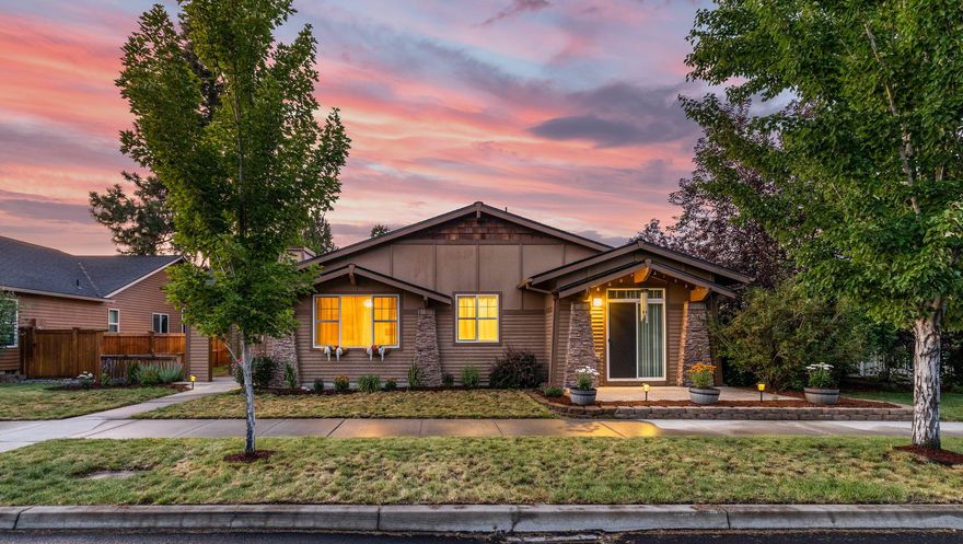 Style, beauty & function come together to create this remarkable single level home. Thoughtful floor plan lives large & open while capturing wonderful natural light from its generous picture windows. Enjoy multiple access doors to one of several outdoor living spaces that highlight a fenced yard & covered courtyard. Spacious parcel with nice tree cover provides seclusion and offers a 3-car garage & fenced small trailer/RV parking! Showcasing dramatic granite counter tops, large kitchen island, cozy slate fireplace, tall ceilings, & real hickory wood floors throughout the main living! With plenty of storage home, is both attractive & functional. Second master suite boasts a private entrance making it perfect for in-law quarters, home office, studio or guest space. Exceptional investment with optional furnishings, artwork, dishes etc. Located in a charming community with a beautiful park & nice walking paths. Minutes from trails, shopping & dining.