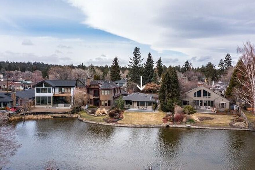 This beautiful riverfront home is situated in downtown Bend, near all the amenities that Bend has to offer. With two bedrooms and a separate office, this home boasts an open floor plan, with a private deck in back with hot tub. Enjoy a glass of wine as you watch the geese settle onto Mirror Pond. Or enjoy the restaurants and food carts just a few blocks away on Galveston and Newport Ave. Launch your kayak or paddle board from your back yard. Live the life you deserve.