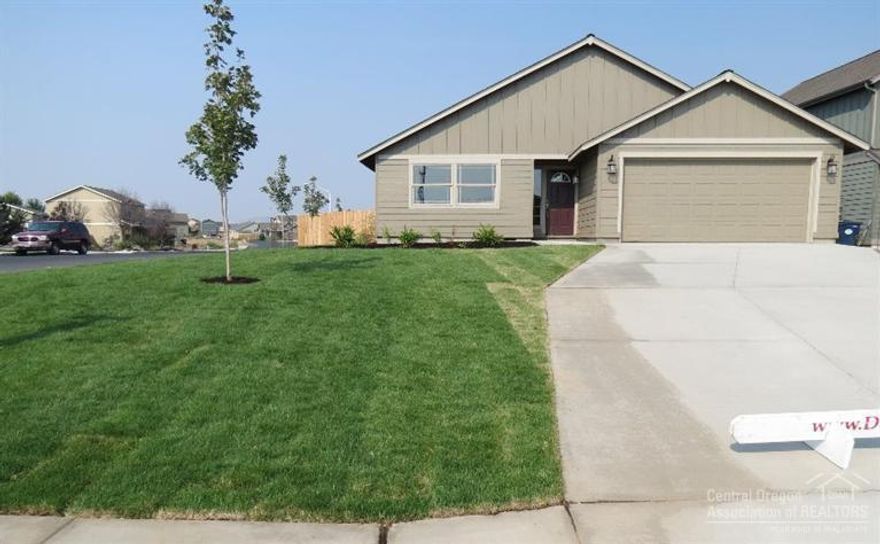 You are going to love this new construction home in the SW Redmond neighborhood of Julina Park. 1,814 SF of living space all on one level with 3 spacious bedrooms, 2 full bathrooms. The home features vaulted ceilings in the living room, a family room off the custom kitchen and laminate flooring in the main living areas. Great curb appeal through a double car attached garage, full landscaping with sprinkler system, fencing and a nice corner lot location. Model home open Friday through Sunday 12 to 5.