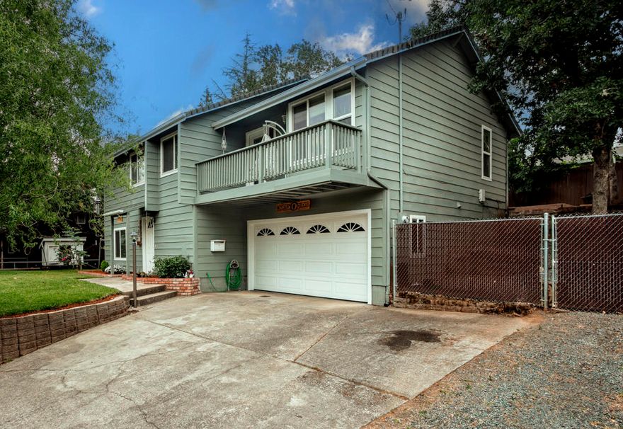 Stylish**Spacious**Versatile**
Custom**Unique** FOURTH Bdrm/AIR BNB? Potential !!
 On the Bottom Level is a Huge Living space (4th bdrm/office/bonusroom). It has a Full Bathroom with its Own Entrance! Perfect Opportunity for Extra Income (AIR BNB?) (Rental?)- Your teenager or Mother-in-Law to have their own Private Space. Also, downstairs is a Nice Mudroom with plenty of Storage and Laundry.  Walk up to a Bright Sunny Beautiful Open Floor Plan- with Newly Redone Gorgeous Floors!
Lovely Vaulted Ceilings, Wood trimmed Large windows and a Cool private Balcony with Views just to start. So much storage in this Kitchen. Nice countertops and all the Appliances included.  Glass Sliders to the huge, fenced Backyard with a deck for Entertaining Family and Friends. 2 Great sized Bedrooms and a Large Primary with Attached restroom- in one of the Best Neighborhoods in town - just a Hop Skip and a Jump to Hawthorne Park, Highland Elem. and North Middle School. SAFE Friendly Neighborhood!