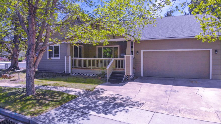 Discover thsi stunning single-level, 4  bedroom gem on nearly 1/4 acre.  Experience seamless indoor/outdoor living with a spacious covered proch and large exposed aggregate patio.  Inside enjoy a 'Great Room' design with wood floors, vaulted ceilings, central A/C, and a chef's island kitchen with large breakfast bar.  Outside find a fully fenced backyard, RV Parking pad, a tranquil waterfall and pond, hot tub, large shed, and raised garden beds, all offering exceptional privacy.  Located in the desireable Boyd Acres Estates and easy access to the new Costco.  Come see this before it's gone!