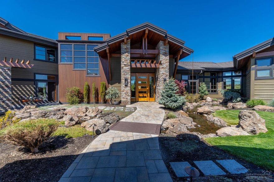 Designed and built by award winning Norman Building & Design this NW Contemporary home embodies comfortable luxury living in Central Oregon. Over 11 acres in Bend's premiere Highlands at Broken Top Community. Main level features 2x5 Black Brazilian Slate tiles within floor heating. Main level master suite with spa like bath, tile shower, soaking tub, walk-in closet with W&D. Main level family/media room with 120'' drop down HD projector, wet bar, black out shades make for classic home movie nights. Gourmet Chefs kitchen complete with Subzero, Miele and Wolf appliances, 100 bottle wine cooler & double beer tap. Fully automated Crestron system. All bedrooms are ensuite plus upstairs studio w/large private deck and bath can easily convert to 4th ensuite bedroom. Main level office. Relax in the outdoor living space complete with gas fireplace, ceiling heaters, 46'x18' pool and hot tub all backdropped by the white capped Cascade Mountains. Oversized 5-car garage + RV bay with 12' door.