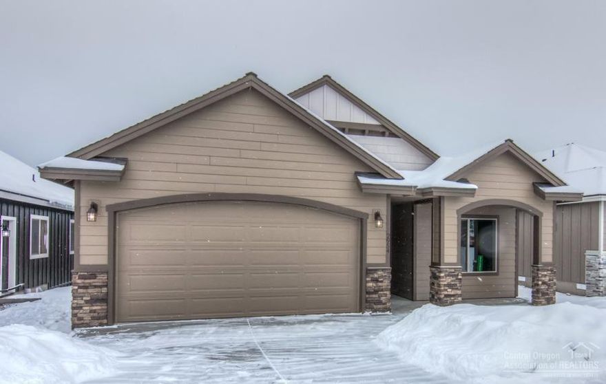 Begin building your traditions in the Hamilton plan in our newest phase! Striking open floor plan is perfect for entertaining with spacious kitchen including stainless appliances, custom cabinets, full height backsplash and breakfast bar. Stunning stone fireplace is accented with alder mantle to match your beautiful alder wood front door. You will love the covered patio w/direct access from both the master suite & great room. Close to the new park and on a quiet street!