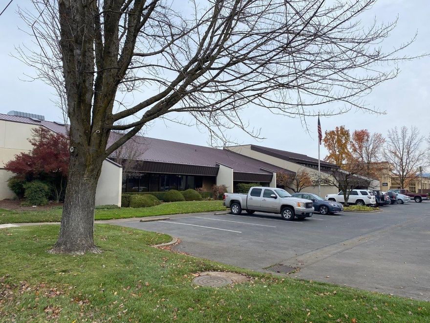 Rare 70,000 square foot industrial building situated on 5.43 acres for sale or lease! Previously utilized as a warehouse/distribution facility, this concrete tilt-up warehouse building has 25' clear height ceilings, 11 truck loading docks, and a 1,728 square foot refrigerated cooler room.  The building features approximately 14,000 square feet of quality office space in the front, and a large fully fenced and paved yard area in the back.  Adjacent 1.27 acre excess parcel is included for potential future expansion.  Located adjacent to Costco, in close proximity to the Central Point I-5 interchange.  Call listing Broker for further information.