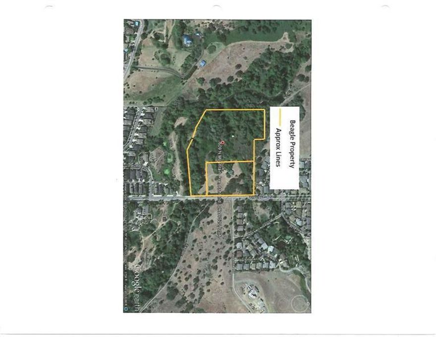 Property is in the North Mountain Neighborhood plan. Within the City of Ashland and close to downtown. 11+ acres bordering Bear Creek. A portion of the property is dedicated green-space and within the 100 year flood plain which enhances the privacy and natural beauty. Property can be subdivided or become an exclusive single family residential property.