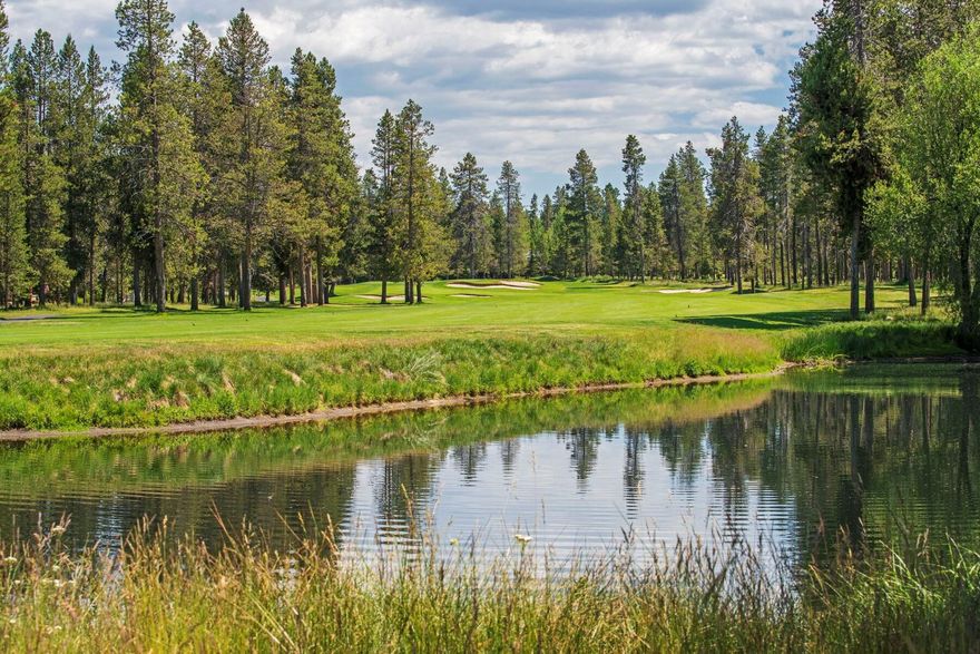 Only 26 families are lucky enough to call The Alberellos in Sunriver home. This Luxury Mountain Chic Townhome sits directly on the massive Woodlands Golf Course Pond, along with unobstructed views of the 10th and 18th fairways. This home was remodeled to the highest standards by the renowned builder, Sun Forest Homes. Home boasts luxurious accessories, loft built in office space, high end finishes, 100 bottle wine cooler, views from nearly every window, floor to ceiling windows, grand fireplace, soaring ceilings, open floor plan, multiple suites, private deck and a hard to find two car garage. The Alberellos are a private and exclusive community that does not allow nightly renters. Enjoy all the Sunriver amenities, abundance of nature along with a private accessible tennis/pickleball court. Home sold partially furnished.