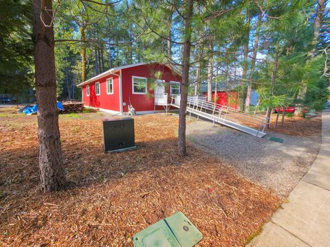 Photo of 451 Stage Stop Drive, Cave Junction, OR 97523 (MLS # 220219485)