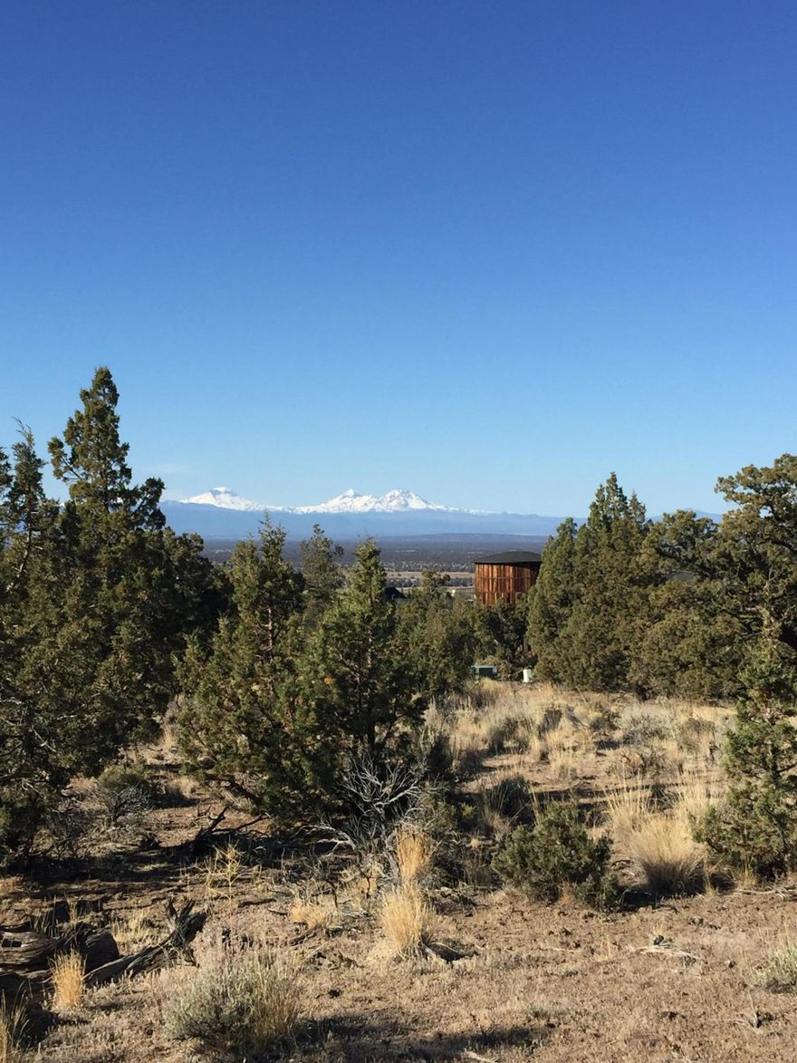 Perched towards the top of the property with beautiful Cascade Mountain views, this home site is ready for you to build your dream home. The common area located to the south allows for extra privacy and the high desert terrain captures the true central Oregon feeling.  Enjoy all the Benefits of Membership, Athletic Center with 3 Pools, Water Slide and Lazy River, Cascade Pool (Adult Only Pool), Equestrian Center, 18 Hole Award Winning Golf Course, Spa Brasada, Member Club Room, Restaurants, Hiking, Biking, Fishing, Horse Back Riding and much more!