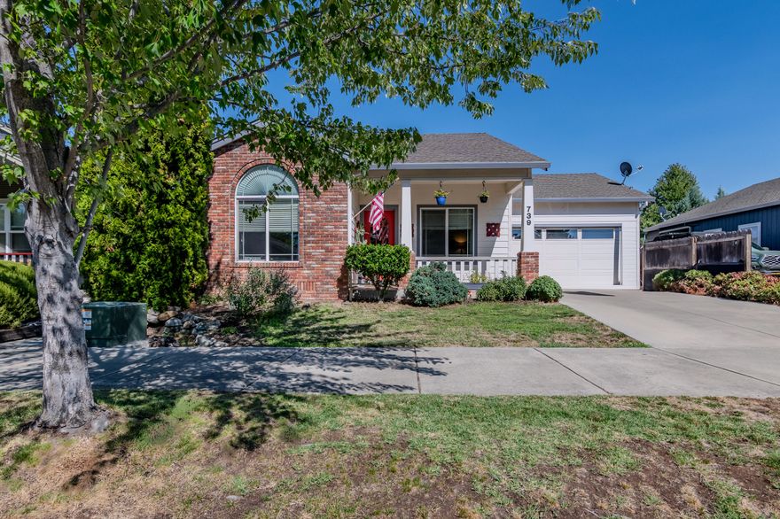 The covered front porch welcomes you to this charming 3 bedroom home nestled in a quaint neighborhood. The split floor plan  layout offers quiet retreats for everyone while keeping the heart of the home - kitchen and living - central.  Laminate flooring throughout, vaulted and trayed ceilings. The kitchen has views to the backyard, an eating bar, all appliances and an adjoining dinning area.  Spacious primary bedroom with adjoining bath that features double vanity, jetted tub, shower and walk in closet.  Fenced backyard, timed sprinklers and a covered patio make it a great area for outdoor entertaining.  The neighborhood also offers a city park with a playground. Sellers current VA loan has an interest rate of 3.15% and is assumable for a veteran using their entitlement benefits.