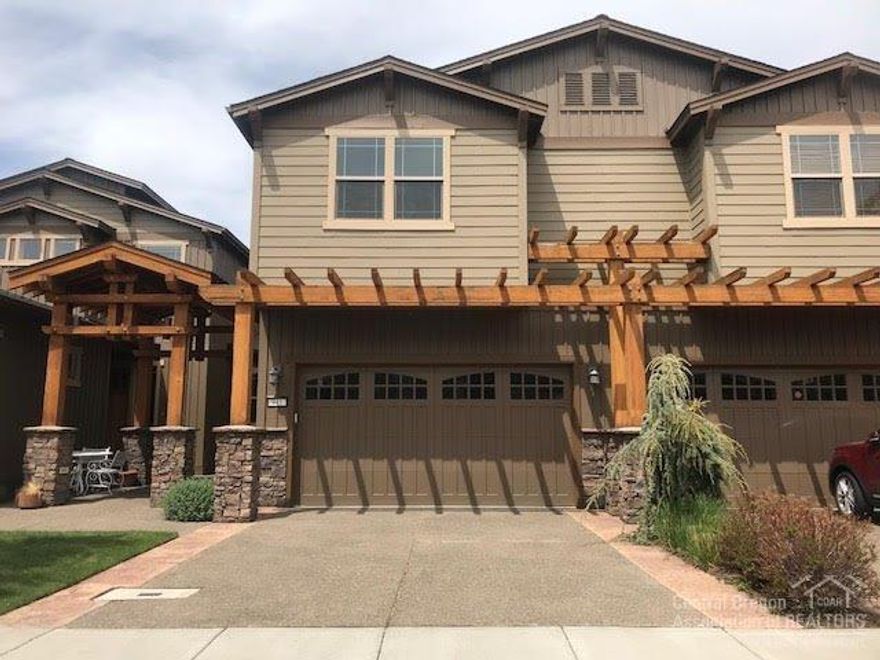 Gorgeous view town home on the Bluffs at River Bend in the Old Mill District. Lovely views of the Deschutes River, Cascade Mountains, Old Mill District! Spacious entry, 3+ bedrooms, 3 baths (office/4th bdrm. plus full bath main level). Features slab counter tops in island kitchen, walk-in pantry; floor-to-ceiling rock fireplace in great room. Master suite with 2nd view balcony, separate shower, and lovely tub. Large double garage, separate utility room, central-air. Wonderful location close to everything