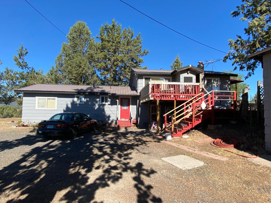 53 Acres in E Langell Valley! Lots of potential here.  This property is a cute 3 bedroom 1.5 bath home with nice kitchen. Lots of cabinets, a sun porch and open Living Room/Dinning Room.  The master bath have a large jetted tub. Large deck for those summer time BBQ;s.  Large 24 X 48 Shop as well as a 20X24 Open RV Bay. With an additional Large shop