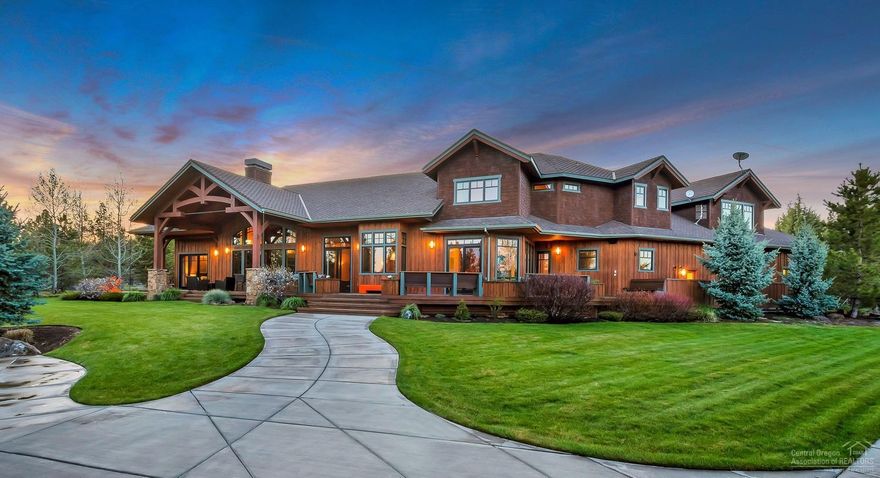 This spectacular Tumalo estate feels like a peaceful oasis, nestled on 5.74 secluded acres. Enter through the gated driveway, to a home so architecturally beautiful it will take your breath away. The stunning 6368 square foot home has elegant yet rustic design features. The grand entrance opens into the stunning great room, complete with vaulted ceilings, picture windows, exposed wood beams, custom built-in cabinetry, and floor-to-ceiling stone fireplace. The kitchen is ideal for entertaining, and has everything a chef could desire. The main level master suite feels like a five-star resort with custom fireplace and spa-like bathroom with dual closets, and soaking tub. Two bedroom suites with bonus room upstairs. In addition to this home's 4-bay oversized garage, there is a 2 bay shop/garage with a 4th bedroom upstairs. Immaculate fenced grounds, extensive paver patio, sport court and 1/4mi gravel path within the property. In the Bend school district & a short drive to Downtown Bend.