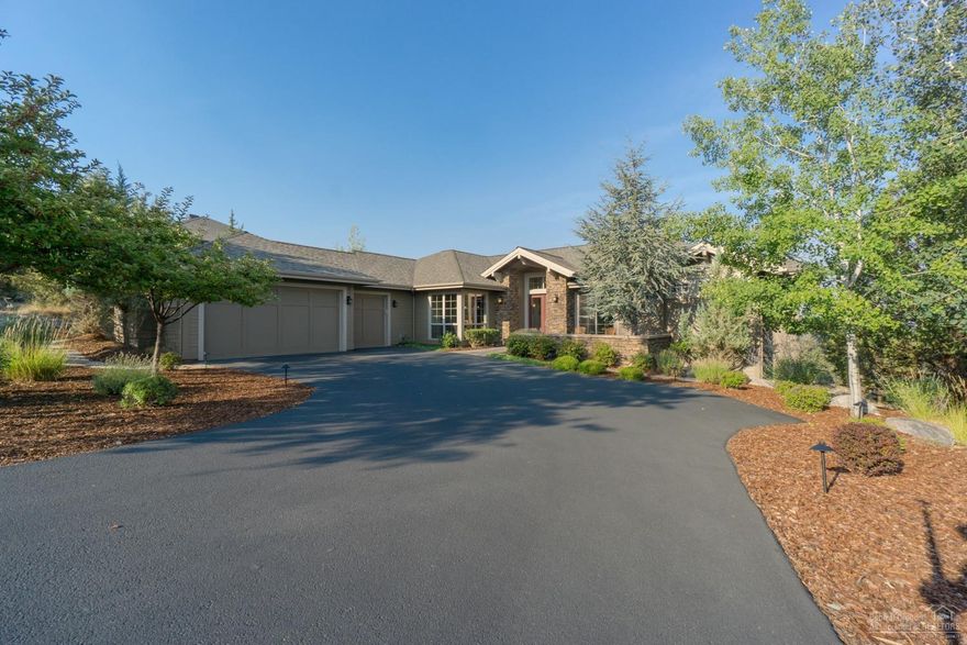 Gorgeous one level with Cascade Mountain views (view photos to follow when smoke clears). Great room plan with soaring ceilings, walls of windows, slate tile floors, & extensive built-ins. Entertainer's dream kitchen with granite counters, island, built-in buffet, gas cook-top, & breakfast bar. Master suite with private paver deck, huge walk-in closet, soaking tub with jets, & separate tile shower. Office opens to paver courtyard. Large storage area under home.