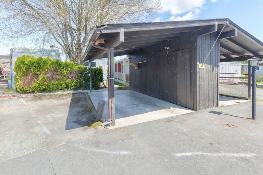 Seller is offering 2 months of space rent with acceptable offer! Welcome to your comfortable, inviting retreat, perfectly tailored for enjoying your golden years. Hm has been thoughtfully updated w/modern living in mind. From the moment you walk in the front door you are soaking up the open, airy atmosphere. You'll love the beautifully updated kitchen w a large island that includes newer appliances like a Bosch DW and a gas range. Newer mini split units for energy efficient heating and cooling. You have 2 nicely sized bdrms and 2 bthrms. Just wait until you feast your eyes on the primary bdrms' en suite. Talk about the epitome of luxury and relaxation you have a large soaking tub AND a gorgeous tiled walk in shower! Wander out to the covered porch and enjoy a cup of coffee while you relax taking in the serenity of your views of the pond. There is a wonderful fenced yard just waiting for the gardening enthusiast to bring out the beauty that is already there.