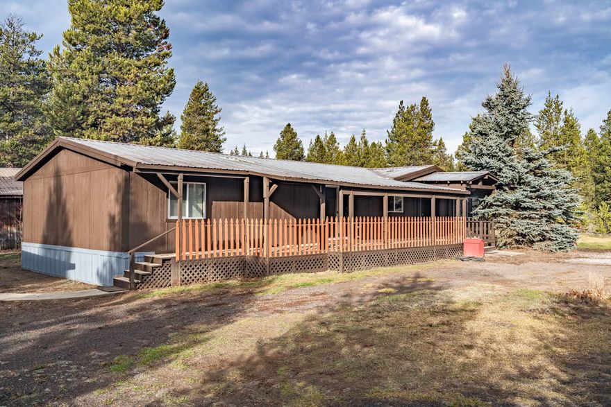 Lovely updates both inside & out for this 1809 sq ft Marlette manufactured home. Situated on an acre it has a detached double garage with heated shop AND a has a large barn which offers so many possiblities ie home business, animals, or perhaps a perfect spot for your RV. Well-laid out with an open floor plan this 3 BR 2 Bath home has an efficient kitchen with an eating bar, two living areas, dining area, lots of windows and good separation of master from the other 2 BR. Some of the updates include: New int & ext paint, new engineered wood floors, new windows, new carpet, new stove top & dishwasher, heat pump. The well pump and septic were replaced in 2017. Sliders from the living/dining area take you to a large covered porch ideal for entertaining or to enjoy some quiet outdoor time. Home is comfortable yet lives large. Enjoy country living.