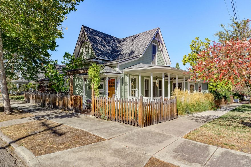 This 3BR/2BA historic gem is perfectly placed in the heart of the railroad district on a beautiful, R-2, corner lot. Since it's last purchase, no stone was left unturned while restoring this home & preserving its original charm. Inside & out, the home has been professionally designed & updated. On the main level, you'll be greeted by a light-filled entryway & a family room w/tray ceiling, large windows & access to a cozy, covered front porch. A large, gourmet kitchen w/wolf range, skylights & vaulted ceilings is centrally located to the laundry room, dining room w/fireplace and built-ins + full bath w/clawfoot tub. Upstairs you'll find the master bedroom w/balcony, 2 additional bedrooms & a shared full bath. A large deck off the back of the home is perfect for entertaining and overlooks the stunning, irrigated gardens filled w/glorious trees, climbing plants & raised garden beds + workshop. New siding, exterior & interior paint, full landscaping remodel, kitchen & bath remodel and more