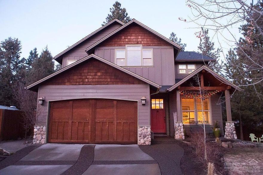 Enjoy peace and quiet and privacy on a big lot in popular SW Bend yet walk to the River Trail and Old Mill District. This craftsman home has two sets of sliding barn doors and fun, artistic flare throughout. All three bedrooms plus a bonus area are upstairs. Downstairs has an office or dining room off the front entry and a big great room space. The fully fenced backyard has plenty of room for kids & animals to play and adults to relax on the deck. Home comes with an awesome designer chicken coop & Tee Pee.