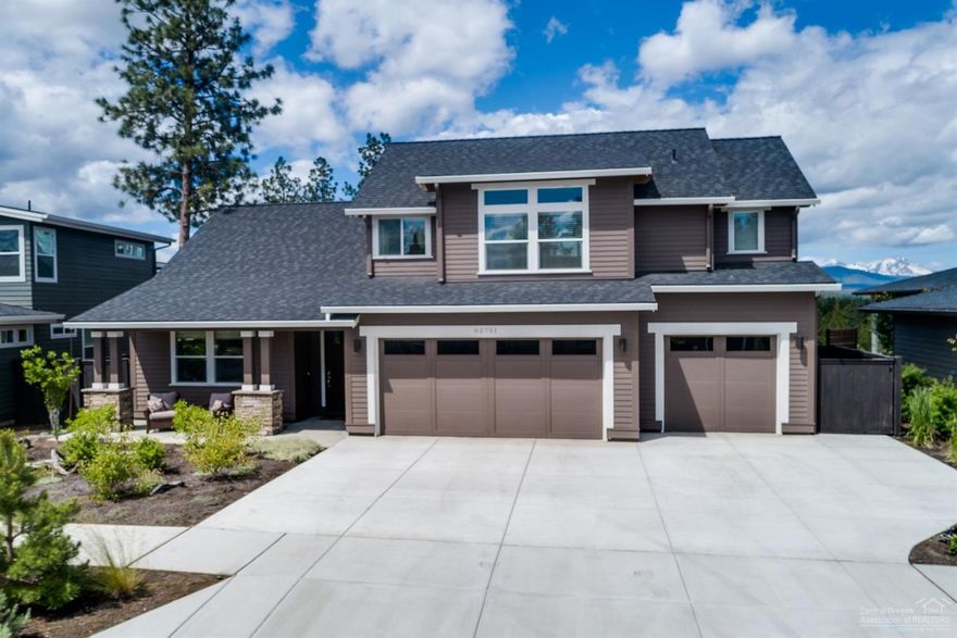 Spectacular Cascade Mountain and Deschutes National Forest views in an unbeatable westside location! This gorgeous 3,224 sq foot home sits on almost 1/4 acre in desirable Shevlin Landing. Easy access to Shevlin Park for hiking and biking and less than 2 miles from North West Crossing and the Newport Avenue retail corridor. This property provides you with a little bit of elbow room while not sacrificing the proximity to everything amazing Bend has to offer. A true gem! This like new home has extensive upgrades including high-end GE Monogram appliances, custom kitchen, skylights, solar tubes, designer window coverings, UV treated windows, and a paver patio with gas fire pit. Home boasts 4 bedrooms, 3 baths, an additional office (could be 5th bedroom), large bonus room, and 3-car garage. It's a spectacular find providing main floor living at its finest with 4th bedroom suite and bonus room on the second level.