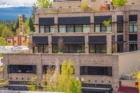 Photo of 919 NW Bond Street #402, Bend, OR 97701 (MLS # 220227232)