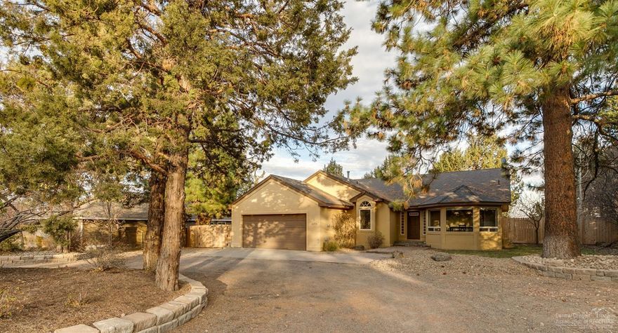 Welcome home! This single level house with separate shop/RV garage is ready for a new owner. No HOA. Inside you will find a great room with gas fireplace, vaulted ceiling, and open to the kitchen. The formal dining room is intimate with plenty of natural light. Built-in wall and ceiling speakers in the master bedroom and great room provide an immersive sound experience. All speaker wiring is set within the master bedroom for a cleaner look in the great room. There are speakers mounted under the eves on the back deck as well. (Deck speakers stay.) The home and shop are wired for security cameras. Monitor for security cameras in master walk-in closet stays. In addition to the 2-car attached garage, the INTERIOR shop approximate dimensions are 41x21' RV garage and 31x50' short garage. There is parking behind the gate on the north end of the home as well. Bring your toys! Make an appointment for your private tour today! Listing agent,Jennifer Linn, has personal relationship with seller.