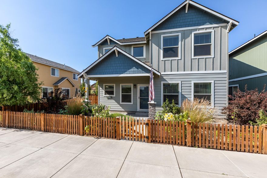 Lovely Gardenside home facing greenbelt common area with flowers, mature landscaping and open grassy areas.  Park, playground and Pavilion a short stroll down the sidewalk alongside all the gorgeous greenery.  Open concept living, with lots of natural light!  Master on the main level with step-in shower and large soaker tub, walk-in closet.  3 more bedrooms upstairs with dual sink bathroom, utility room, and large bonus/media/play room!  Hardwood floors, Stainless steel appliances, pantry, and central A/C!  Fenced yard with paver patio and hot tub.