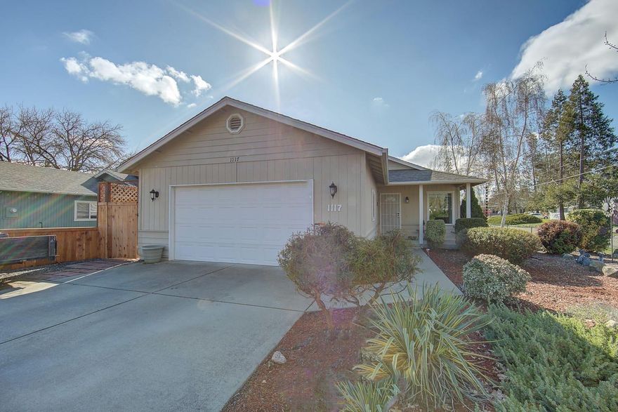 Home sweet home!! Exceptionally maintained home featuring 3 bedrooms 2 baths and 1340 square feet built in 2001. Open floor plan, vaulted ceilings, dining area with sliding glass door leading to patio/deck and backyard. Kitchen features island with storage many cabinets and custom lighting. Guest bath has newer sky light, ceiling fans in bedrooms and a large laundry room leading to 2 car garage. Backyard features 2 decks, and lawn, fully fenced for privacy. Corner lot with possible RV parking. Low maintenance front yard is also fenced. All information is deemed accurate but not guaranteed. Buyers to do their due- diligence.