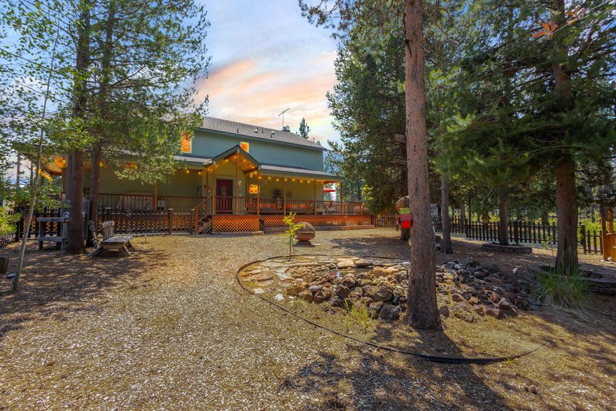 Tucked at the end of a quiet cul-de-sac, this nearly 1-acre retreat backs directly open to National Forest—an endless playground for your hiking boots, bikes, or ATVs. A thoughtful blend of modern upgrades and natural warmth awaits inside, featuring a detached garage with a studio apartment for guests or creative pursuits. Elegant oak floors, new Dekton counters, and a custom chef's kitchen set the stage for both comfort and function. The full wraparound porch invites slow mornings and lively gatherings, while the hot tub offers a front-row seat to starlit skies or snowy serenity. Just 25 minutes from Bend, 15 minutes to the Cascade Lakes, and a quarter mile from the fish hatchery, with Fall River only a short walk away, this is Central Oregon living at its best.