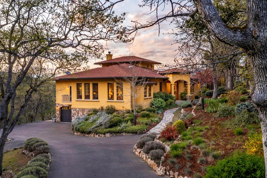 Contemporary 3,153 SqFt Tuscan-inspired home with additional 1,378 SqFt guest cottage and separate multi-purpose studio on 10 private acres, just 5 minutes from town! Park-like grounds feature elaborate gardens with meandering pathways, terraced rock walls, mature oaks, along with nearly 1,000 feet of seasonal creek frontage. Owner-built with renowned local designers and contractors to balance warmth and functionality with the highest caliber of construction and finishes. Top-quality materials include genuine stucco and stone exteriors, metal-clad Sierra Pacific windows, 50-year composition roof, limestone hearth, California chestnut floors, and vertical grain fir doors and trim. Stunning views from nearly every window of the home, especially from a tranquil master suite. Gourmet kitchen equipped with custom cabinetry, dual convection ovens, 6-burner natural gas range, and pantry. Inquire with agents for extensive documentation on all details of construction, surveys, and systems.