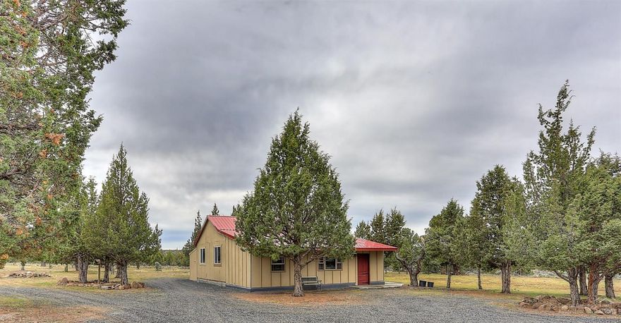 Great little cabin with a nice addition & most of the furniture is included! It has 2 legal bedrooms but could easily be 3. There are 2 ductless heat pumps to heat & cool the house & a 3rd could be added if desired. Seller had a built in propane heater installed in the family room as back up if needed. The property is well manicured, includes ceiling fans, has underground utilities, is nicely graveled & well treed for privacy. Enjoy the views from your lovely covered deck! Lots of options on this one!