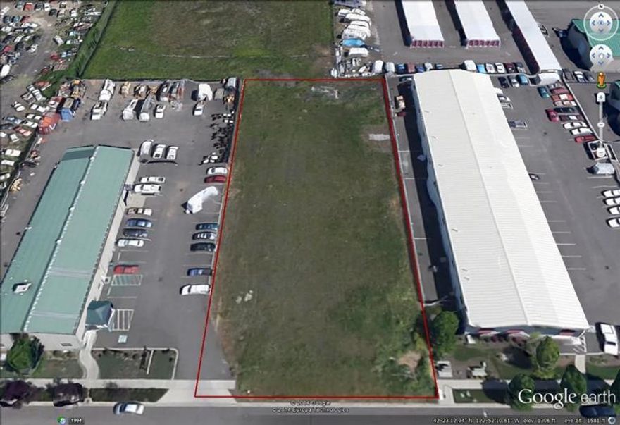 Very usable and level .83 acre property zoned light industrial. Many permitted uses. Great location for industrial building, easy access to whole valley and highways.