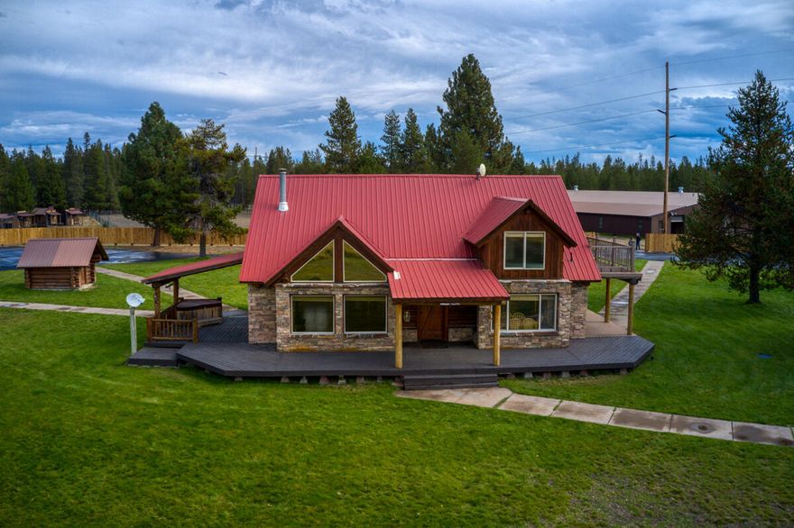 This 11.4-acre private mini ranch is just 20 minutes from La Pine has all the amenities of a beautiful country setting with private access to the little Deschutes River.
Most people look forward to the weekends when they can get away from it all and relax by the river, fish, kayak or just sit back on the deck and enjoy the elk as they go by.  This property has so much to offer with a custom Log Home, custom Log Game Room, large barn/shop equipped with power and water. Pavement all the way to the home.  With all its amenities this is a must see. For more information call your agent for a private showing.