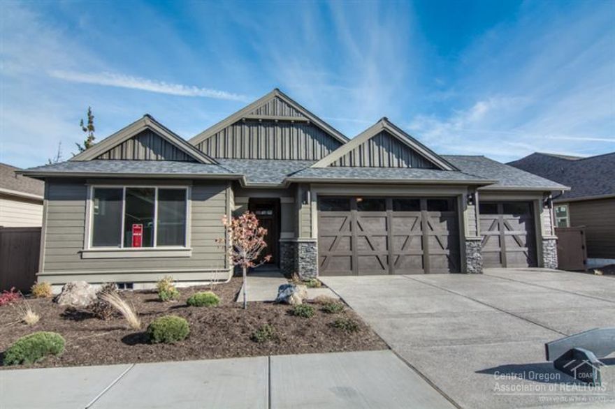 This 2005 sf one level Pinehurst plan is in Phase 15 River's Edge. Enjoy a gated community next to the River Trail. The PINEHURST single-level living plan includes a grand entrance into a vaulted great room. This plan includes a spacious three car garage. The large windows provide lots of light. The quality Pahlisch finishes include, quartz countertops, engineered hardwoods and SS appliances. Photos of actual home.