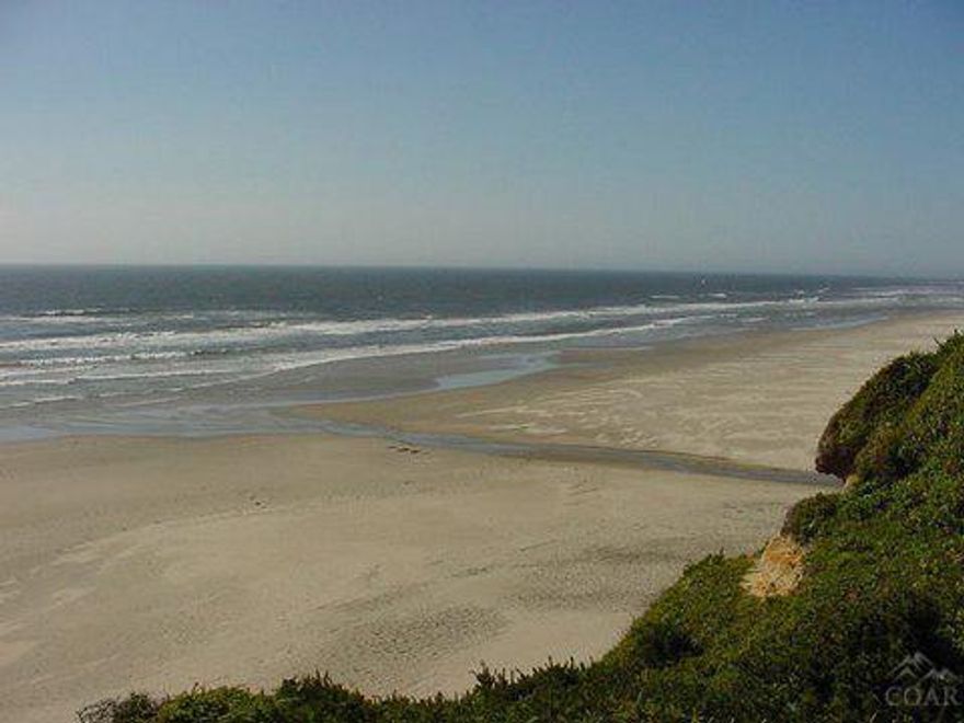 Great South Beach Oceanfront Getaway! Sweeping ocean views and miles of uninterrupted beaches. Two bedroom, two bath quaint cabin situated on a quiet cul-de-sac with a quick walk to beach access. Convenient location just 2.8 miles south of the Newport Bay Bridge and local airport. Broker owned.