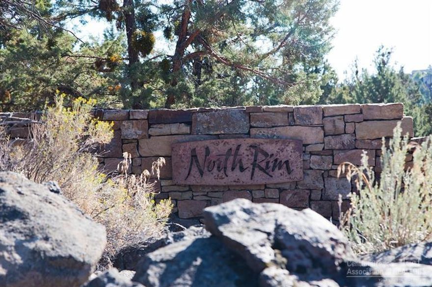 Located in the stunning North Rim Community, this lovely 1.25 Acre corner Lot provides mountain views & topography for a fantastic building site. Deschutes River Trail access borders the southwestern portion of the Lot. North Rim is a private, gated community surrounded by 27 acres of naturally preserved open space, creating the feel of a sanctuary. The community features one acre or larger lots, privacy, paver walking paths, tennis court and park as well as the gorgeous North Rim Lodge.