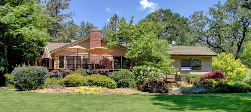 Delightful Rogue River Retreat! This serene, 3+ acre park-like setting offers a beautifully maintained single-level home, guest quarters, workshop, lush lawns, well-fenced pastures, soaring trees and flowering plantings, all with low-bank Rogue River frontage. You'll love the peaceful indoor and outdoor spaces, the amazing views, the spacious decks, the lovely gardens and nice sense of privacy. The home includes soaring vaulted spaces, a cozy fireplace, wonderful light, a relaxed-living floor plan and plenty of room for extended family or friends. The detached guest quarters with vaulted living, fireplace and bedrooms is ideal for short or long-term stays. Always wanted a shop for your hobbies? It'just steps away from the main house, too. AND, you can expand this estate by purchasing the adjacent 1+ acre home site with well, installed septic, irrigation and pastures. If you've always dreamed of owning a close-in riverfront paradise--You've Found It.